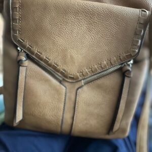 This is a genuine Leather crossbody bag